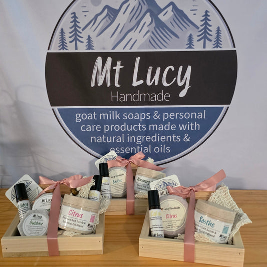 Display of Mt Lucy soap products with a branded background